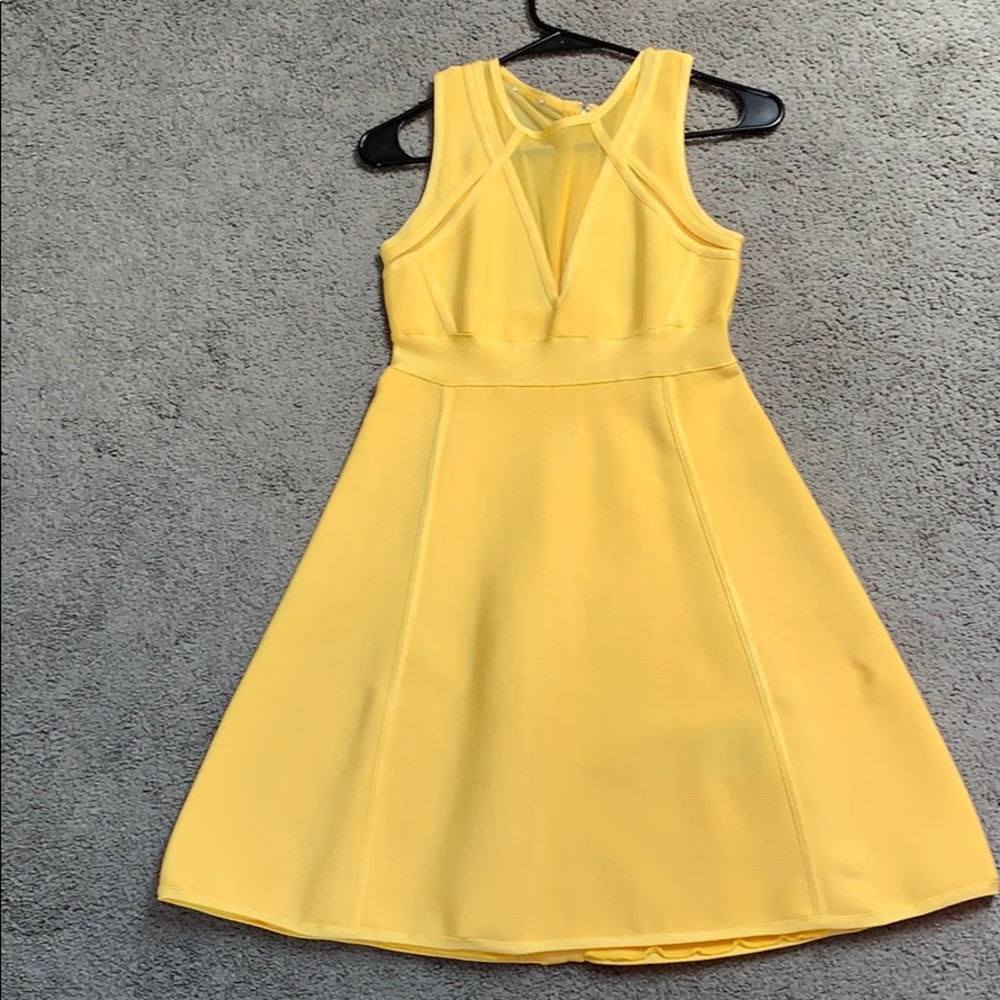 Lulus yellow dress with mesh details.